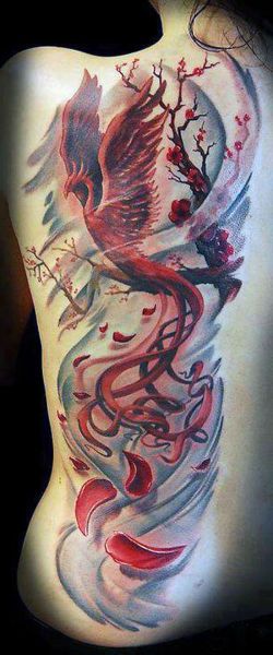 tatuaże damskie phoenix na boku