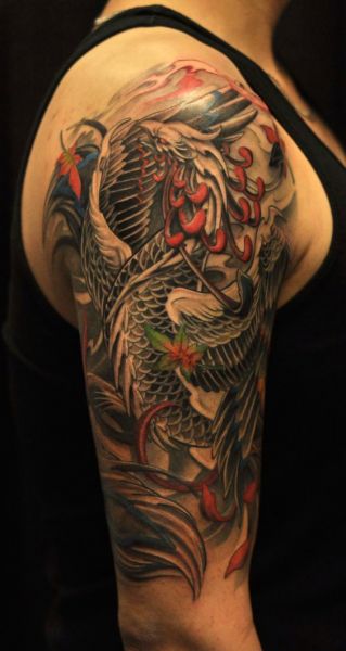 tatuaże męskie na ramie phoenix