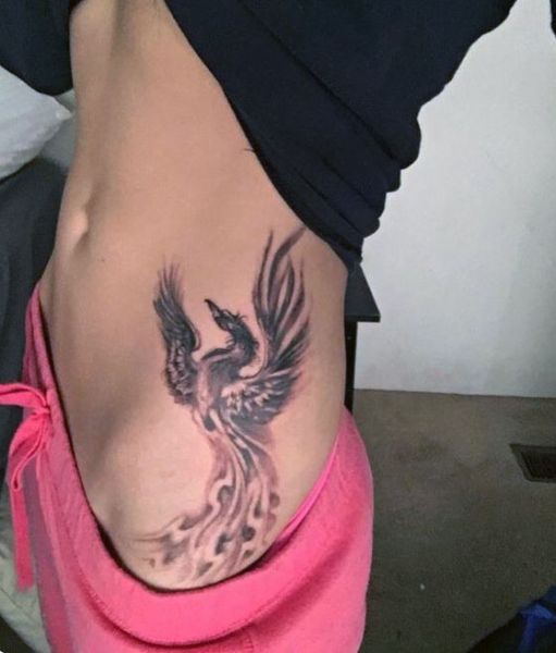 phoenix hip tattoo for woman
